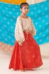 Buy_CUTE COUTURE_Red Silk Print Phool Top With Bandhani Bloom Lehenga _Online_at_Aza_Fashions