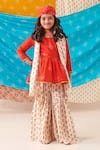 Buy_CUTE COUTURE_Red Muslin Silk Print Bandhani Bloom Peplum Kurti And Sharara Set _at_Aza_Fashions