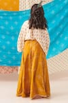 Shop_CUTE COUTURE_Yellow Silk Print Phool Motif Top With Bandhani Bloom Lehenga _at_Aza_Fashions