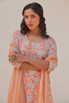 Shop_Kapraaaha_Orange Muslin Block Print Floral Round Kurta Set _Online_at_Aza_Fashions