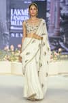 Shop_Payal Singhal_Ivory Net Embroidered Zardozi Round Najia Floral Scalloped Saree With Blouse _at_Aza_Fashions