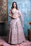 Buy_Jiya by Veer Design Studio_Gold Net Embroidered Cutdana V-neck Floral Mirrorwork Bridal Lehenga Set _at_Aza_Fashions