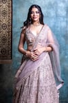 Jiya by Veer Design Studio_Gold Net Embroidered Cutdana V-neck Floral Mirrorwork Bridal Lehenga Set _at_Aza_Fashions