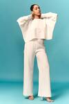 Buy_Emblaze_White Crepe Plain Round Cut Out Top And Embellished Trouser Set _at_Aza_Fashions