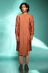 Buy_studio error_Orange Cotton Silk Solid Cut-out Hem Kurta _at_Aza_Fashions