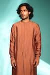 studio error_Orange Cotton Silk Solid Cut-out Hem Kurta _at_Aza_Fashions