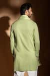 Shop_studio error_Green Cotton Hand Embroidered Thread Cross Over Flap Layered Kurta _at_Aza_Fashions