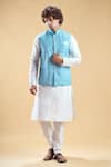 Aryavir Malhotra_Sky Blue Jacquard Embroidery Floral Geometric Nehru Jacket And Churidar Set _at_Aza_Fashions