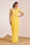 Buy_Suruchi Parakh_Yellow Georgette Crepe Embellished Sequin Plain Pre-draped Saree With Blouse _at_Aza_Fashions