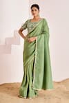 Buy_Suruchi Parakh_Green Georgette, Silk Sequins, Beads Round Border Saree With Embroidered Blouse _at_Aza_Fashions