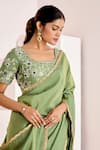 Suruchi Parakh_Green Georgette, Silk Sequins, Beads Round Border Saree With Embroidered Blouse _at_Aza_Fashions