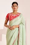 Suruchi Parakh_Green Georgette, Silk Sequins, Beads Butti Scallop Saree With Contrast Blouse _Online_at_Aza_Fashions