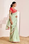 Suruchi Parakh_Green Georgette, Silk Sequins, Beads Butti Scallop Saree With Contrast Blouse _at_Aza_Fashions