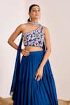 Suruchi Parakh_Blue Georgette Embroidery Floral Asymmetric Tiered Lehenga Blouse Set _at_Aza_Fashions