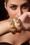 Buy_VIVINIA by Vidhi Mehra_Gold Plated Kundan Studded Temple Bangle - Set Of 2 _at_Aza_Fashions