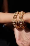 VIVINIA by Vidhi Mehra_Gold Plated Kundan Studded Temple Bangle - Set Of 2 _Online_at_Aza_Fashions