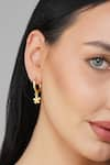 Buy_Zariin_Gold Plated Dancing Lotus Carved Hoops _at_Aza_Fashions