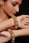 Buy_VIVINIA by Vidhi Mehra_Gold Plated Kundan Onyx Stone Studded Bangle - Set Of 2 _at_Aza_Fashions