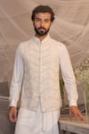 Shop Amit Arora Ivory Silk, Cotton, Modal Beads, Embroidery Hand Waistcoat With Aligarhi Set at Aza Fashions Shop_Amit Arora_Ivory Silk, Cotton, Modal Beads, Embroidery Hand Waistcoat With Aligarhi Set _at_Aza_Fashions