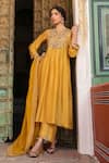 Label Niti Bothra_Yellow Silk Print Floret Butti Notched Neck Gathered Kurta With Pant _at_Aza_Fashions