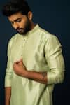 YOSEBA_Green Kurta Bam Silk Textured Pintuck Detail With Pyjama _at_Aza_Fashions