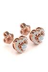 Shop_Divine Solitaires_Rose Gold Imitation Diamonds Heart Shaped Stud Earrings_at_Aza_Fashions