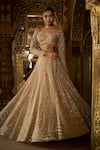 Buy_Seema Gujral_Gold Net Embroidery Bugle Beads Sweetheart Neck Crystal Bridal Lehenga Set _at_Aza_Fashions