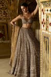 Buy_Seema Gujral_Gold Net Embroidery Sequin Sweetheart Neck Antique Crystal Bridal Lehenga Set _at_Aza_Fashions