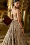 Shop_Seema Gujral_Gold Net Embroidery Sequin Sweetheart Neck Antique Crystal Bridal Lehenga Set _at_Aza_Fashions