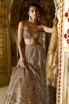 Buy_Seema Gujral_Gold Net Embroidery Sequin Sweetheart Neck Antique Crystal Bridal Lehenga Set _Online_at_Aza_Fashions