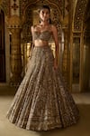 Shop_Seema Gujral_Gold Net Embroidery Sequin Sweetheart Neck Antique Crystal Bridal Lehenga Set _Online_at_Aza_Fashions