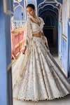 Buy_Seema Gujral_Ivory Net Embroidery Floral Sweetheart Neck Bloom Pearl Bridal Lehenga Set _at_Aza_Fashions