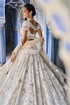 Buy_Seema Gujral_Ivory Net Embroidery Floral Sweetheart Neck Bloom Pearl Bridal Lehenga Set _Online_at_Aza_Fashions