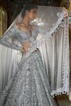 Seema Gujral_Silver Net Embroidery Floral Cutwork Sweetheart Neck Bridal Lehenga Set _Online_at_Aza_Fashions