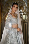 Seema Gujral_Silver Net Embroidery Floral Cutwork Sweetheart Neck Bridal Lehenga Set _at_Aza_Fashions