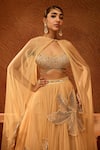 Shop_SAANJH BY LEA_Gold Soft Mesh Embellished Pearl Scoop Floral Embroidered Lehenga Blouse Set _Online_at_Aza_Fashions