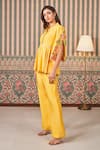 Buy_SAMMOHI BY MOKSHA AND HIRAL_Yellow Dupion Silk Embroidery Floral V-neck Peplum Tunic With Pant _Online_at_Aza_Fashions