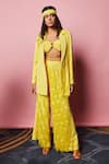 Nirmooha_Yellow Lurex Embellished Bead Cording Textured Bralette With Flared Pant _at_Aza_Fashions