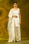 Buy_SHIVANI SABHARWAL_White Cotton Embroidered Gota Round Kurta Flared Pant Set _at_Aza_Fashions