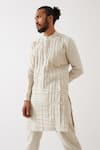 Shop_Son Of A Noble Snob_Ivory Linen Embroidery Logan Pintuck And Pleated Kurta With Trouser _Online_at_Aza_Fashions