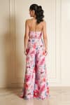 Shop_Vesture_Pink Georgette Print Floral Halter Neck Petal Pizza Jumpsuit _at_Aza_Fashions