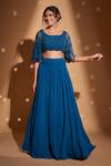 Buy_Rimple Agrawal_Blue Net Embroidery Beads Round Tassels Blouse With Skirt _at_Aza_Fashions