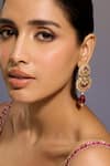 Buy_Tarun Tahiliani_Red Zircon Lotus Stone Embellished Earrings _at_Aza_Fashions