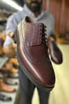 Buy_FELLMONGER_Burgundy Longwing Brogue Pattern Derby Shoes _Online_at_Aza_Fashions