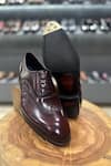 Buy_FELLMONGER_Burgundy Mirror Glossed Patina Wingtip Oxfords _Online_at_Aza_Fashions