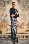 Dash and Dot_Black 85% Cotton Checkered Pattern Draped Saree Skirt _at_Aza_Fashions