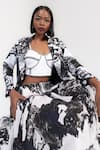 Shop_AMKA_Black Natural Silk Print Musk Bloom Lapel Collar Kola Jacket And Skirt Set _Online_at_Aza_Fashions