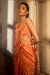 SSHILPA SAMRIYA_Orange Crepe Hand Embroidered Leheriya Printed Pre-draped Saree With Blouse _at_Aza_Fashions