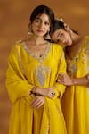 Isha Gupta Tayal_Yellow Kurta And Pant Silk Embroidery Zardozi V Neck Peacock Placement Set _at_Aza_Fashions