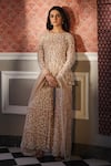 Shop_Astha Narang_Peach Net Embroidery Floral Round Peplum Kurta And Sharara Set _at_Aza_Fashions